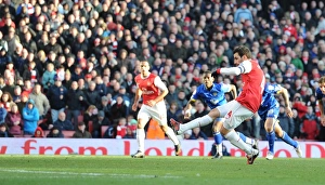Cesc Fabregas shoots past Leeds goalkeeper Kasper Schmeichel to score the Arsenal goal Cesc Fabregas shoots past Leeds goalkeeper Kasper Schmeichel to score the Arsenal goal