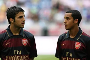 Cesc Fabregas and Theo Walcott (Arsenal) Cesc Fabregas and Theo Walcott (Arsenal)