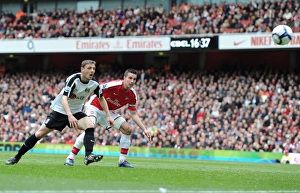 Chris Baird heads past Mark Schwarzer to score an own goal, Arsenal's 3rd of the match Chris Baird heads past Mark Schwarzer to score an own goal, Arsenal's 3rd of the match