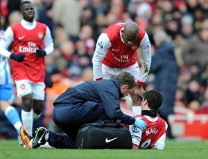 Colin Lewin and Abou Diaby check on the injured Samir Nasri (Arsenal). Arsenal 2 Colin Lewin and Abou Diaby check on the injured Samir Nasri (Arsenal). Arsenal 2