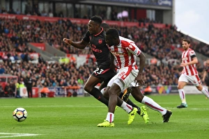 Danny Welbeck (Arsenal) Mame Diouf (Stoke). Stoke City 1:0 Arsenal. Premier League Danny Welbeck (Arsenal) Mame Diouf (Stoke). Stoke City 1:0 Arsenal. Premier League