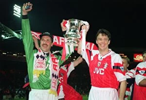 Images Dated 8th April 2005: David Seaman and David O Leary hold aloft the FA Cup Trophy after the game