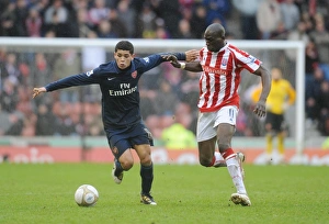 Denilson (Arsenal) Mamady Sidibe (Stoke). Stoke City 3:1 Arsenal, FA Cup 4th round Denilson (Arsenal) Mamady Sidibe (Stoke). Stoke City 3:1 Arsenal, FA Cup 4th round