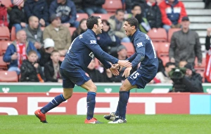 Denilson celebrates scoring the Arsenal goal with Cesc Fabregas. Stoke City 3:1 Arsenal Denilson celebrates scoring the Arsenal goal with Cesc Fabregas. Stoke City 3:1 Arsenal