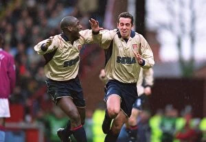 Images Dated 16th November 2006: Edu celebrates scoring the 1st Arsenal goal with Sol Campbell