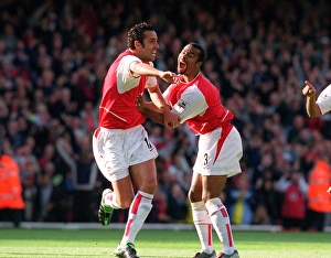 Edu celebrates scoring Arsenals 1st goal from a free kick with Ashley Cole Edu celebrates scoring Arsenals 1st goal from a free kick with Ashley Cole