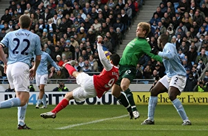 Eduardo shoots past Manchester City goalkeeper Joe Hart to score the 2nd Arsenal goal Eduardo shoots past Manchester City goalkeeper Joe Hart to score the 2nd Arsenal goal