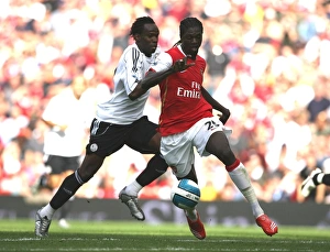 Emmanuel Adebayor beats Claude Davis Emmanuel Adebayor beats Claude Davis