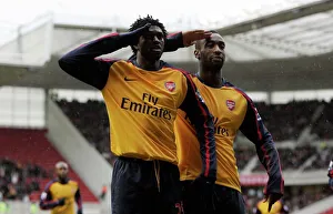 Team/players coaches djourou johan/emmanuel adebayor celebrates scoring arsenals Team/players coaches djourou johan/emmanuel adebayor celebrates scoring arsenals