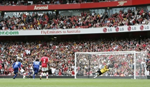 Emmanuel Adebayor scores Arsenal's goal from the penalty spot Emmanuel Adebayor scores Arsenal's goal from the penalty spot