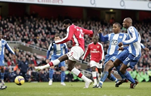 Emmanuel Adebayor scores Arsenal's goal under pressure Emmanuel Adebayor scores Arsenal's goal under pressure