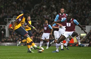 Emmanuel Adebayor's shot hits West Ham's Julien Flaubert Emmanuel Adebayor's shot hits West Ham's Julien Flaubert