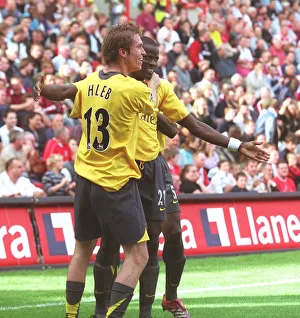 Emmanuel Eboue and Alex Hleb (Arsenal) celebrate the 2nd Robin van Persie goal Emmanuel Eboue and Alex Hleb (Arsenal) celebrate the 2nd Robin van Persie goal