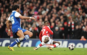 Emmanuel Eboue goes past Porto goalkeeper Helton to score the 4th Arsenal goal Emmanuel Eboue goes past Porto goalkeeper Helton to score the 4th Arsenal goal