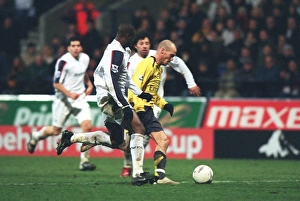 Freddie Ljungberg breaks past Bolton defender Abdoulaye Meite to score the 2nd Arsenal Freddie Ljungberg breaks past Bolton defender Abdoulaye Meite to score the 2nd Arsenal
