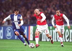 Freddie Ljungberg and Gael Clichy (Arsenal) Lucho Gonzalez (Porto) Freddie Ljungberg and Gael Clichy (Arsenal) Lucho Gonzalez (Porto)