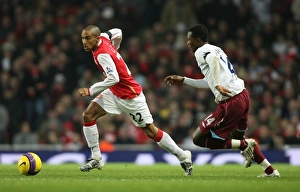 Gael Clichy (Arsenal) John Pantsil (West Ham) Gael Clichy (Arsenal) John Pantsil (West Ham)