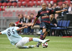 Gael Clichy (Arsenal) Valon Behrami (Lazio) Gael Clichy (Arsenal) Valon Behrami (Lazio)