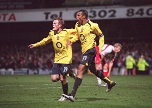 Gilberto celebrates scoring Arsenal's 2nd goal with Sebastian Larsson Gilberto celebrates scoring Arsenal's 2nd goal with Sebastian Larsson