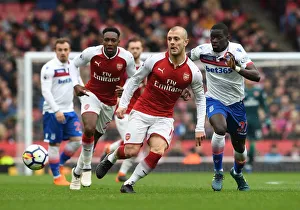 Jack Wilshere (Arsenal) Badou Ndiaye (Stoke). Arsenal 3:0 Stoke City. Premier League Jack Wilshere (Arsenal) Badou Ndiaye (Stoke). Arsenal 3:0 Stoke City. Premier League