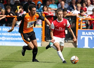Jack Wilshere (Arsenal) Glenn Poole (Barnet). Barnet 0:4 Arsenal. Pre Season Friendly Jack Wilshere (Arsenal) Glenn Poole (Barnet). Barnet 0:4 Arsenal. Pre Season Friendly