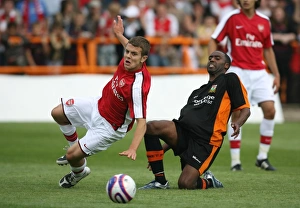 Jack Wilshere (Arsenal) Justin Cochrane (Barnet) Jack Wilshere (Arsenal) Justin Cochrane (Barnet)