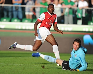 Jay Emmanuel Thomas shoots past Legia goalkeeper Kostyantyn Makhnovskyy to score the 5th Jay Emmanuel Thomas shoots past Legia goalkeeper Kostyantyn Makhnovskyy to score the 5th