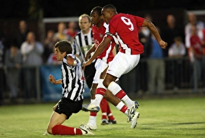Jay Simpson scores Arsenal's 3rd goal under pressure from Jack Bradshaw (Maidenhead) Jay Simpson scores Arsenal's 3rd goal under pressure from Jack Bradshaw (Maidenhead)