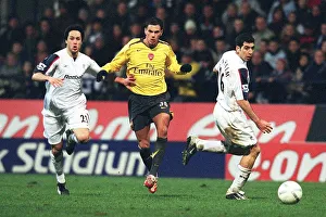 Jeremie Aliadiere breaks past Tal Ben Haim and Idan Tal to set up the 2nd Arsenal goal Jeremie Aliadiere breaks past Tal Ben Haim and Idan Tal to set up the 2nd Arsenal goal