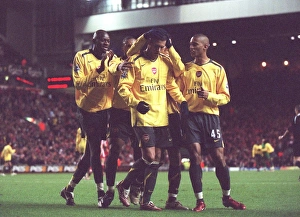 Jeremie Aliadiere is congratulated by Abou Diaby and Armand Traore for setting up Julio Jeremie Aliadiere is congratulated by Abou Diaby and Armand Traore for setting up Julio