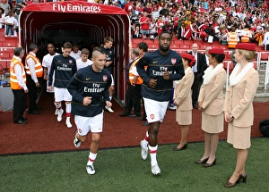 Johan Djourou and Henri Lansbury (Arsenal) Johan Djourou and Henri Lansbury (Arsenal)