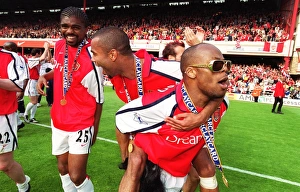 Kanu, Ashley Cole and Sylvain Wiltord celebrate. Arsenal 4:3 Everton, F.A Kanu, Ashley Cole and Sylvain Wiltord celebrate. Arsenal 4:3 Everton, F.A