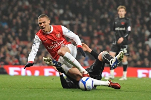 Kieran Gibbs is tripped for the Arsenla penalty buy Orient's Alex Revell Kieran Gibbs is tripped for the Arsenla penalty buy Orient's Alex Revell