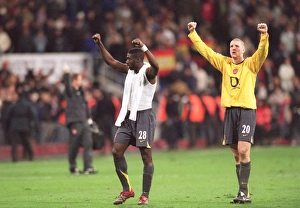 Kolo Toure and Philippe Senderos (Arsenal) celebrate infront of the Arsenal fans at Kolo Toure and Philippe Senderos (Arsenal) celebrate infront of the Arsenal fans at