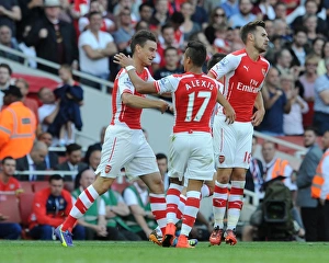 Laurent Koscielny celebrates scoring Arsenals 1st goal with Alexis Sanchez. Arsenal 2 Laurent Koscielny celebrates scoring Arsenals 1st goal with Alexis Sanchez. Arsenal 2