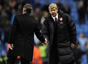 Managers Arsene Wenger (Arsenal) and Roberto Mancini (Man City) shake hands ast the end of the match. Manchester City 0:3 Arsenal, Barclays Premier League, City Of Manchester Stadium, Manchester, 24/10/2010. Credit : Stuart MacFarlane / Arsenal Managers Arsene Wenger (Arsenal) and Roberto Mancini (Man City) shake hands ast the end of the match. Manchester City 0:3 Arsenal, Barclays Premier League, City Of Manchester Stadium, Manchester, 24/10/2010. Credit : Stuart MacFarlane / Arsenal