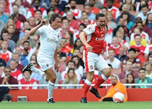 Marc Overmars (Arsenal) Stefano Eranio (Milan). Arsenal Legends 4:2 Milan Glorie Marc Overmars (Arsenal) Stefano Eranio (Milan). Arsenal Legends 4:2 Milan Glorie
