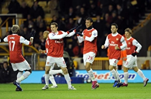 Marouane Chamakh celebrates scoring his and Arsenal's 1st goal with Sebastien Squillaci Marouane Chamakh celebrates scoring his and Arsenal's 1st goal with Sebastien Squillaci