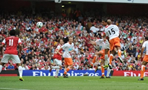 Marouane Chamakh heads past Blackpool goalkeeper Matthew Gilks to score the 6th Arsenal Marouane Chamakh heads past Blackpool goalkeeper Matthew Gilks to score the 6th Arsenal