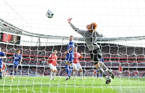 Marouane Chamakh heads past Bolton goalkeeper Adam Bogdan to score the 2nd Arsenal goal Marouane Chamakh heads past Bolton goalkeeper Adam Bogdan to score the 2nd Arsenal goal
