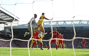 Marouane Chamakh jumps with Liverpool goalkeeper Pepe Reina. Liverpool 1:1 Arsenal Marouane Chamakh jumps with Liverpool goalkeeper Pepe Reina. Liverpool 1:1 Arsenal