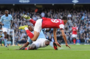 Marouane Chamakh is tripped by Man City defender Dedryck. Manchester City 0:3 Arsenal Marouane Chamakh is tripped by Man City defender Dedryck. Manchester City 0:3 Arsenal