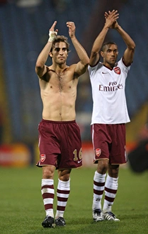 Mathieu Flamini and Gael Clichy (Arsenal) clap the fans at the end of the match Mathieu Flamini and Gael Clichy (Arsenal) clap the fans at the end of the match