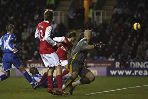 Mathieu Flamini shoots past Reading goalkeeper Marcus Hahnemann to score the 1st Arsenal Mathieu Flamini shoots past Reading goalkeeper Marcus Hahnemann to score the 1st Arsenal