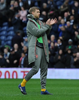 Per Mertesacker (Arsenal) claps the fans after the match. West Bromwich Albion 3 Per Mertesacker (Arsenal) claps the fans after the match. West Bromwich Albion 3