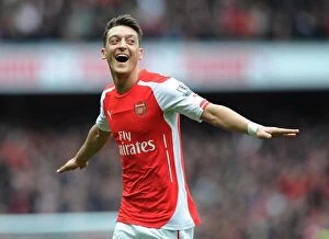 Images Dated 4th April 2015: Mesut Ozil Scores the Decisive Goal: Arsenal vs. Liverpool, Premier League 2014-15