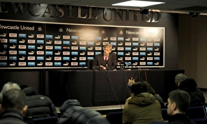 NEWCASTLE UPON TYNE, ENGLAND - DECEMBER 29: Arsenal manager Arsene Wenger holds NEWCASTLE UPON TYNE, ENGLAND - DECEMBER 29: Arsenal manager Arsene Wenger holds