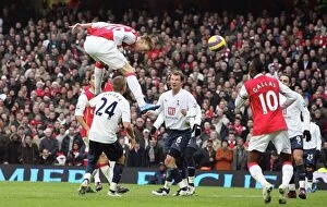 Images Dated 25th December 2007: Nicklas Bendtner scores Arsenals 2nd goal as Teemu Tainio (Spurs) looks on