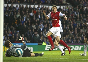 Nicklas Bendtner shoots past Derby goalkeeper Roy Carroll to score the 1st Arsenal goal Nicklas Bendtner shoots past Derby goalkeeper Roy Carroll to score the 1st Arsenal goal