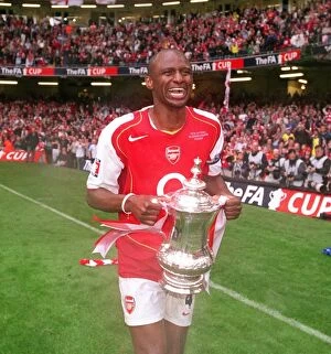 Images Dated 21st September 2005: Patrick Vieira (Arsenal) with the FA Cup Trophy. Arsenal 0: 0 Manchester United